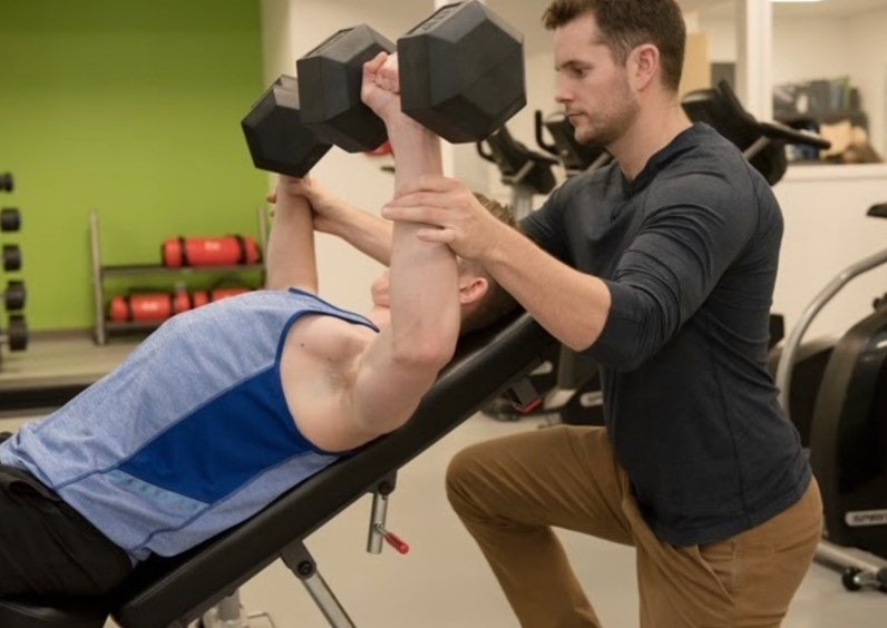 PMBJ working with man on weight training PMBJ working with man on weight training